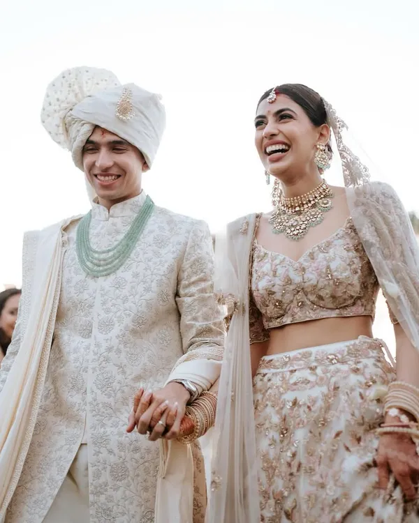 The happiest walk down the aisle. This bride chose a stunning ivory and gold lehenga, and I created a fresh, sun-kissed makeup look to match the outdoor daytime ceremony.
