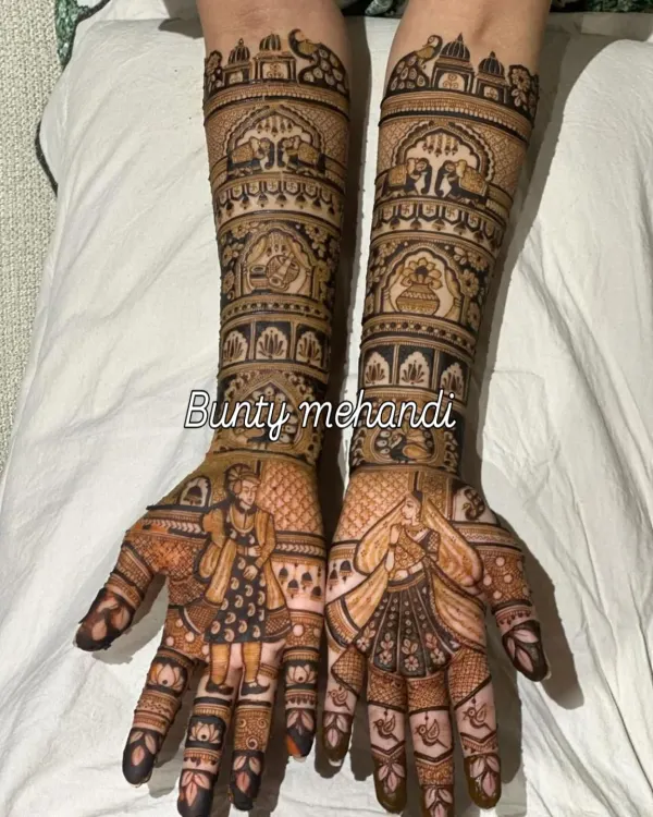 A beautiful depiction of Radha and Krishna, a popular and auspicious theme for bridal mehendi, showcasing fine lines and expressive figures on the palms.