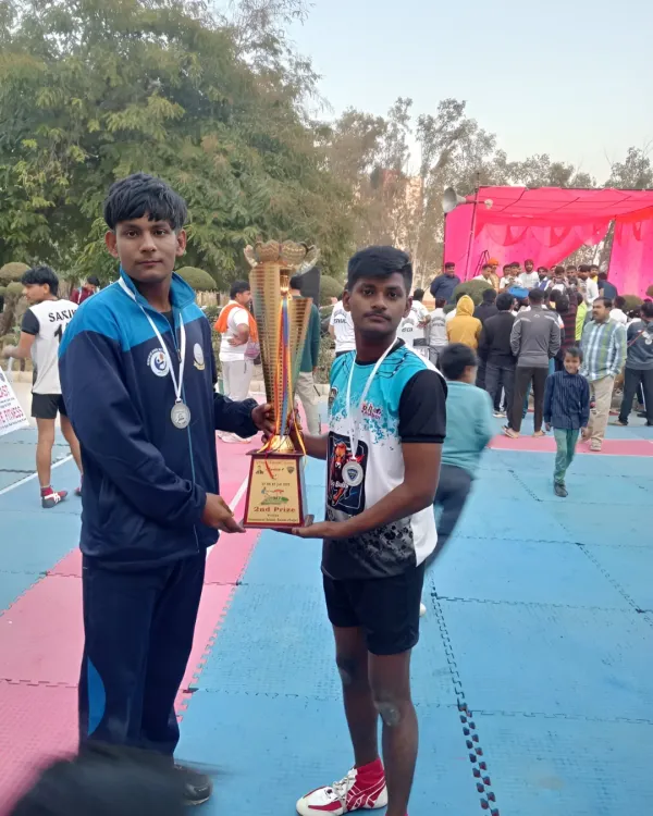 Our players holding the trophy after a successful tournament. This is the moment that makes all the sweat and hard work worth it.