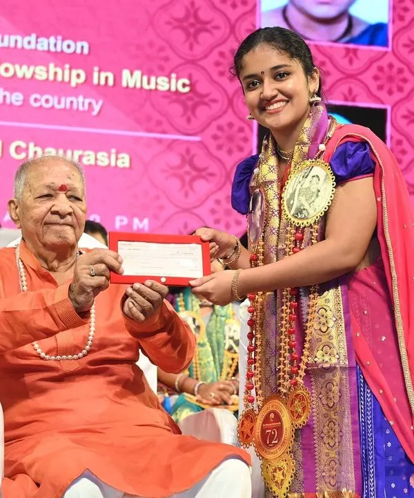 A cherished moment receiving the Bharat Ratna Dr. M. S. Subbulakshmi Fellowship in Music from the legendary flutist Pandit Hariprasad Chaurasia in Mumbai. This fellowship is a great honor and responsibility.