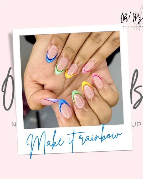 Why choose one colour when you can have them all? This playful French manicure features a different vibrant hue on each tip, creating a fun and eye-catching rainbow effect.