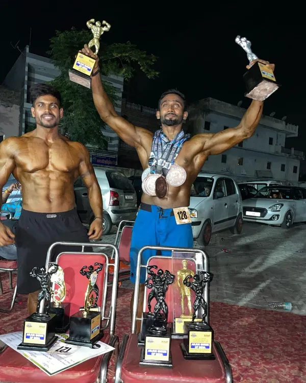 This is the goal. This is what we fight for. My student celebrating his win after months of pure dedication and hard work. The trophies are proof that my contest prep method works.