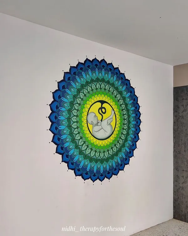 The finished fetus mandala seen in its final location at a fertility hospital. The artwork serves as a powerful symbol of hope and life in the space.
