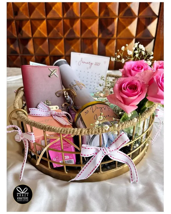 Counting down to a special day? I created this '30 days to go' hamper for a client's wedding countdown, featuring a personalized calendar, passport holder, and other goodies.