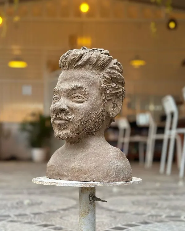 A portrait in clay. This expressive bust, sculpted from raw terracotta, captures a likeness with incredible texture and detail. Sculpting a face is a journey of patience and observation.