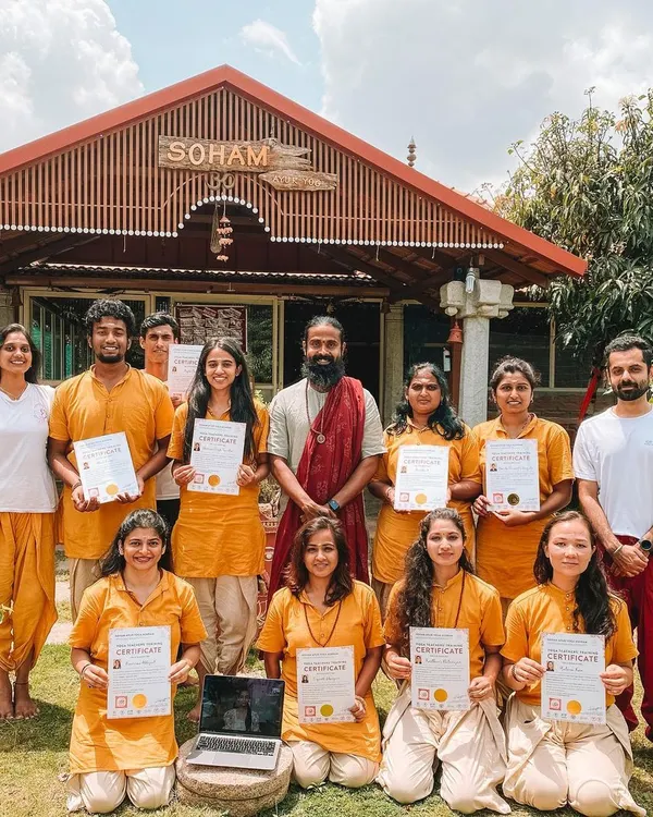 Our graduating class proudly displays their certificates in front of the Soham building. This is the culmination of a month of intense practice, study, and personal growth. Congratulations to our new yoga teachers!