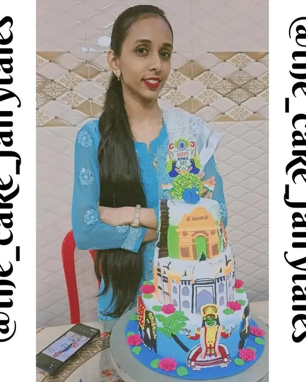 This is me with my India-themed cake that won first prize at the Hunarmand 2 baking competition. I am so proud to have represented our country's culture through my baking.