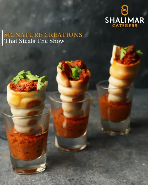 We create signature creations that steal the show. These chicken cones, served in shot glasses with a dipping sauce, are a perfect example of our creative and modern approach to appetizers.