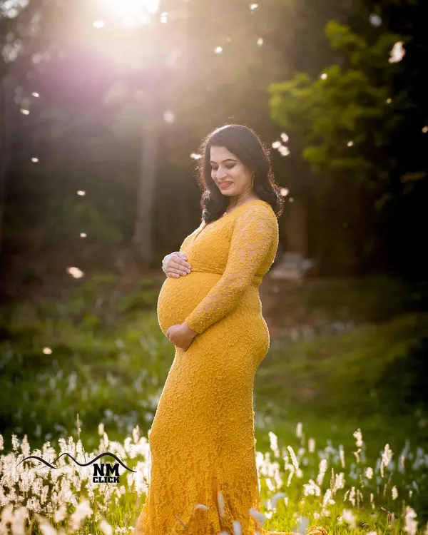 This is the kind of magic we live for. Capturing a serene moment for this mom-to-be during the golden hour, surrounded by nature. The warm sunlight and her beautiful glow create a truly timeless outdoor maternity portrait.