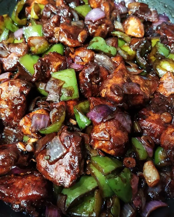 My version of the classic Kolkata-style Chilli Chicken. Every Bengali household has its own recipe for this Tangra-inspired dish, and this one is ours, perfect with noodles or rotis.