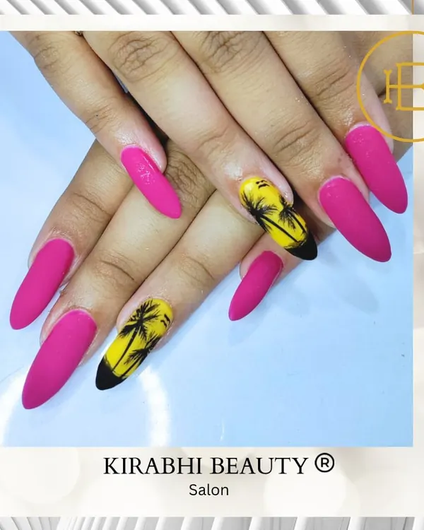 This is one of my favorite vacation-themed nail art designs. I created this look with a vibrant pink matte gel polish and hand-painted palm tree silhouettes for that perfect beach-ready feel. The stiletto shape gives it an extra bit of flair.
