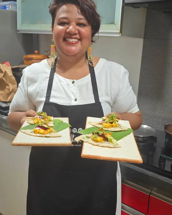 Ready to serve. Here I am with freshly plated appetizers for my 'Country Roads' supper club, where I share dishes inspired by my travels.
