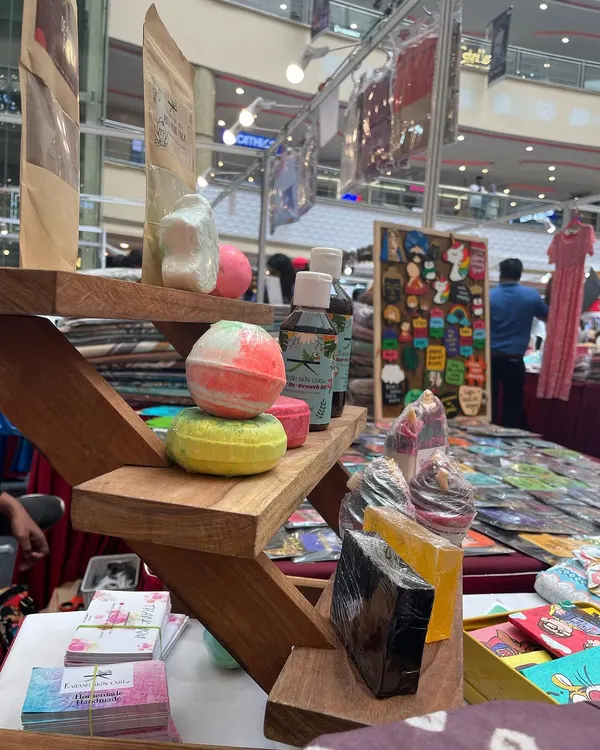 My colourful bath bombs on display at a stall in EA Mall, Chennai. They always catch everyone's eye. You can also see my other handmade soaps and powders in the background.