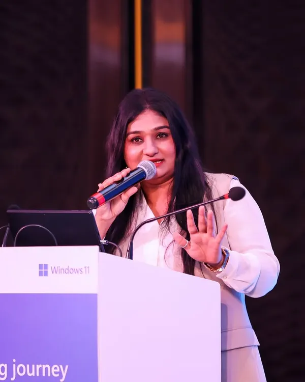 A close-up shot while presenting at an event for Microsoft India. I focus on delivering key messages with clarity and confidence.