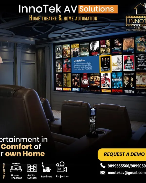 We create stunning home theaters that bring the magic of cinema right into your home. This setup features a large screen, plush recliner seating, and a fully integrated system for an immersive entertainment experience.
