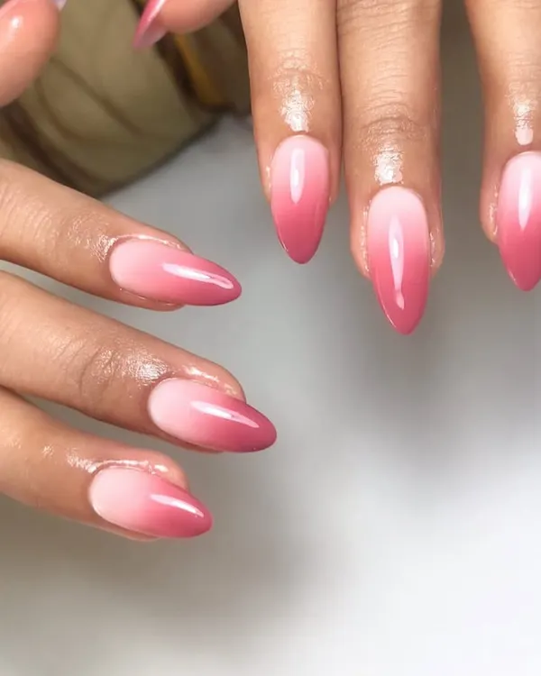 A perfect pink ombré on almond-shaped nails. This classic "baby boomer" style is a soft and elegant choice that's always beautiful.