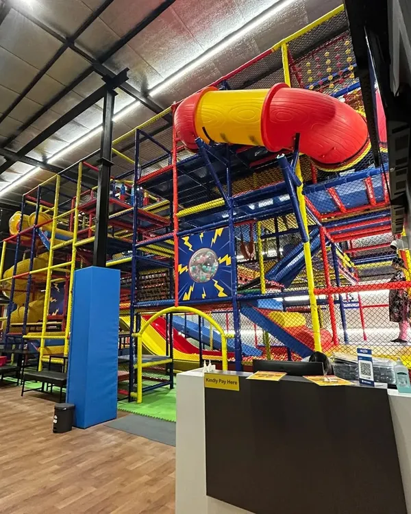 This is the heart of our play zone, a massive, multi-level structure filled with tunnels, obstacles, and slides. It’s a world of adventure designed to spark curiosity and active play.
