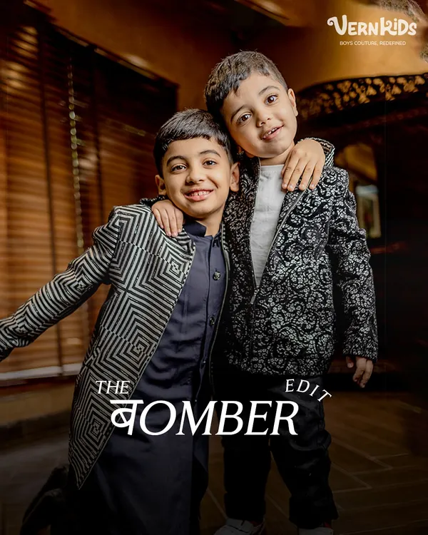 The Bomber Edit. These brothers showcase two of our unique bomber jackets, one with a modern geometric pattern and the other with a classic print, perfect for adding a stylish layer to any outfit.