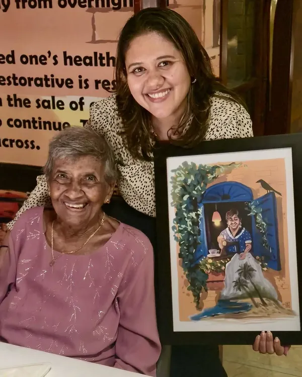 This is why I do what I do. Seeing the joy on a client's face when they receive a custom piece of art that captures a precious memory is the most rewarding part of my work. This personalized portrait was a gift, turning a cherished photo into a timeless keepsake.