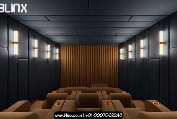 This design features a sophisticated and modern aesthetic with dark, paneled acoustic walls and a matching ceiling. The warm, vertical wall sconces provide soft, indirect lighting, creating an elegant and comfortable environment for enjoying films.