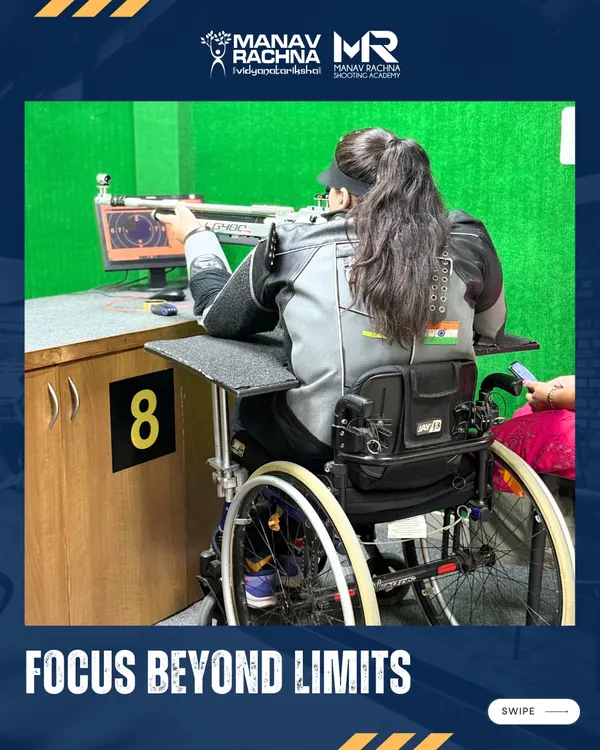 A female para-athlete takes aim with her rifle, demonstrating incredible focus from her wheelchair at our indoor facility. My adaptive training ensures every athlete can compete at their highest level.