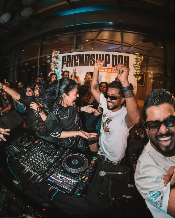 This is what an SMXS Takeover looks like. Me and Shameless Mani behind the decks, surrounded by a high-energy crowd at our Friendship Day sundowner in Pune. It's pure madness.