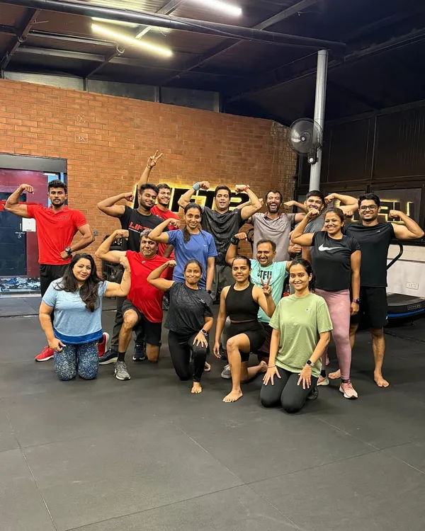 Just a few members of our incredible LIFTR community, flexing and celebrating another great session together. The energy is contagious!