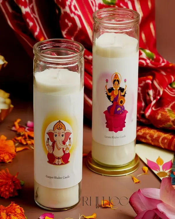 My Ganpati and Laxmi Ruhee Candles are crafted to bring prosperity and peace into your home. The tall glass jars feature beautiful illustrations, making them perfect for your puja or as a spiritual gift.