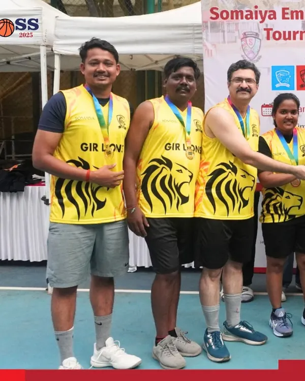 The champions of the inaugural Somaiya Basketball TOSS 2025, the GIR LIONS, celebrating their victory. I provide high-quality team jerseys and awards to make corporate leagues feel official.