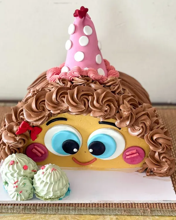 Celebrating a half-birthday! This is a 1/2 cake I made for Kiara's "one and a half" birthday. It's a super fun and unique way to mark those mini-milestones.