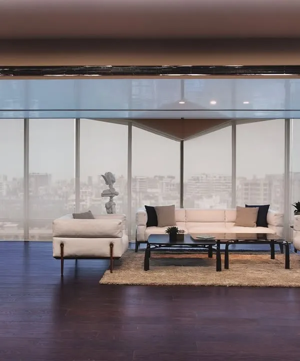 This 2000 sq. ft. DLH office is an oasis in the sky. Massive glazing on two sides invites the city skyline in, while four distinct zones for work, meetings, and relaxation ensure seamless functionality and style within a minimalist framework.