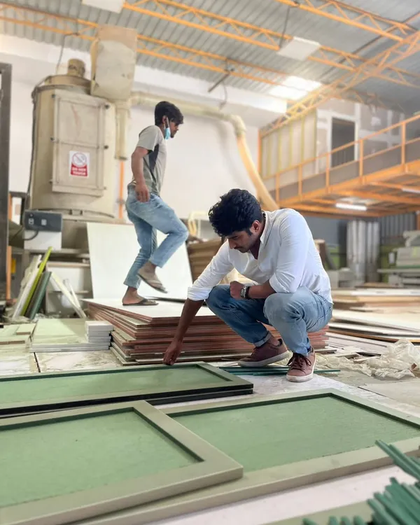 Before it becomes a piece of furniture, it's just sawdust and skill. Here's a look inside our workshop, where our architects and carpenters collaborate to ensure every panel is perfect.