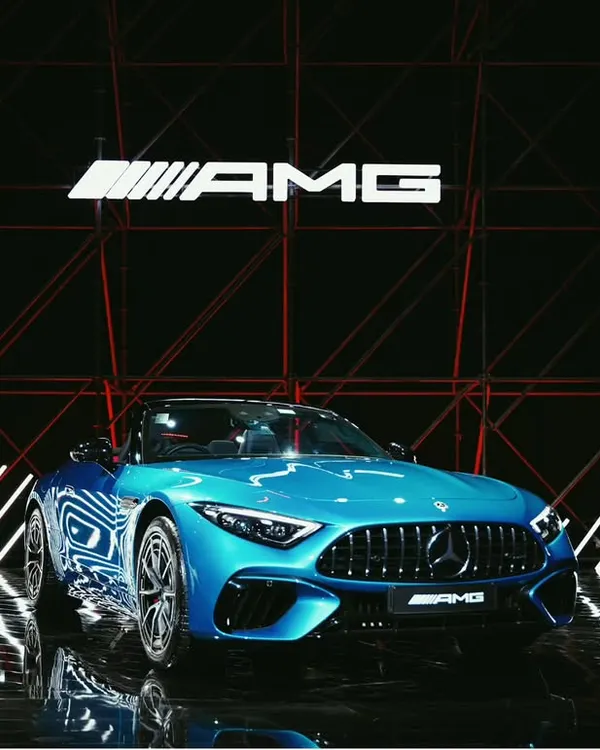 The stunning blue Mercedes-AMG takes center stage. My lighting and composition work to make the car the undeniable hero of the shot, perfect for press kits and marketing materials that need to make a strong impression.