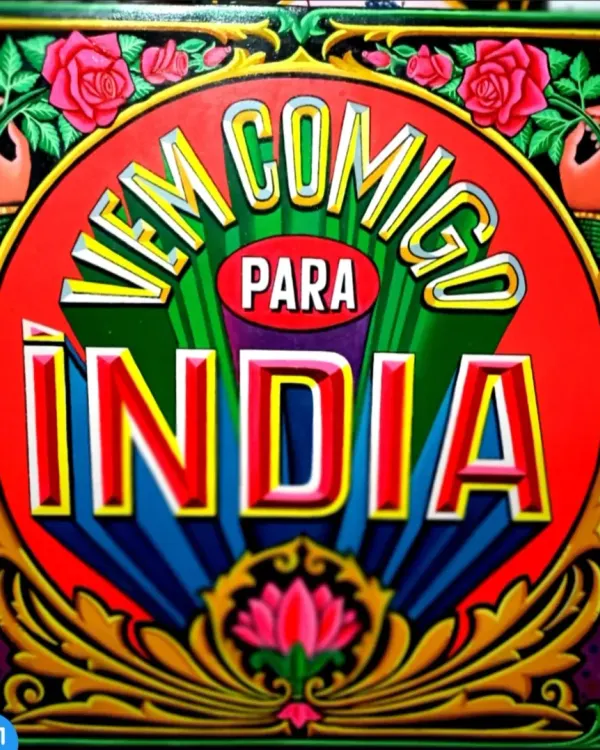 A close-up of the central typography from the "Vem Comigo Para India" sign, featuring a lotus and decorative flourishes.