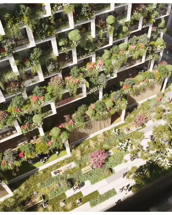 The Sky Gardens project in Hyderabad redefines high-rise living by giving each apartment a deep, private garden. This aerial detail shows the density of the green facades, which act as a natural cooling system and provide residents with a direct connection to nature.