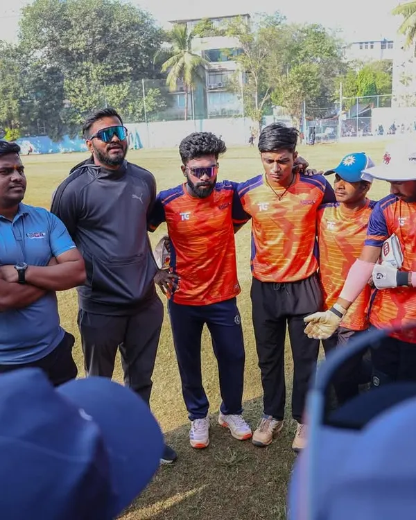 A team huddle during a preparation match for the Purshottam Shield. This is where I share strategies and motivate the players. Moments like these build unity and ensure everyone is working towards the same goal.