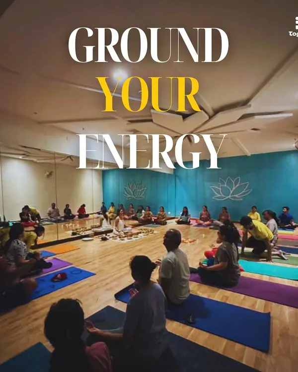 "Ground Your Energy." This image captures the essence of my sound healing workshops, where a group gathers to find stillness and balance through the power of sound vibrations.