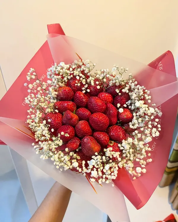 A gift that’s both beautiful and delicious. I create these fresh strawberry bouquets, nestled in delicate baby's breath and wrapped beautifully, for a surprise that delights all the senses. It's a perfect alternative to traditional flowers for any celebration.
