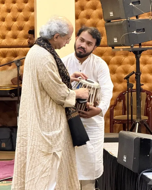 A precious moment with my Guruji, Pandit Yogesh Samsi ji. He is not just my teacher but my guide in music and in life. Here he is inspecting my tabla, a simple act that holds deep meaning for me.