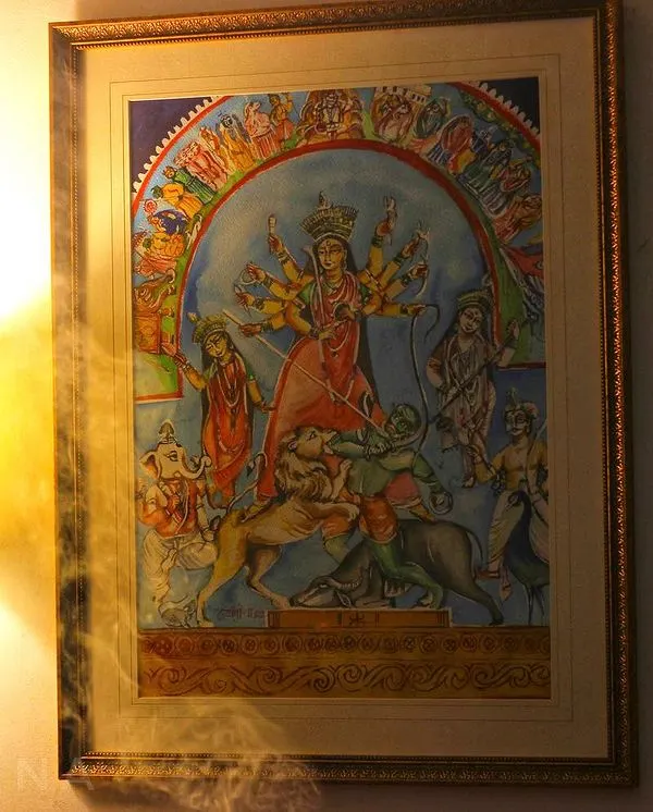 A detailed painting of Ma Durga, capturing her divine energy. This piece is now framed and part of a beautiful home, bringing the festive spirit of Durga Puja all year round.
