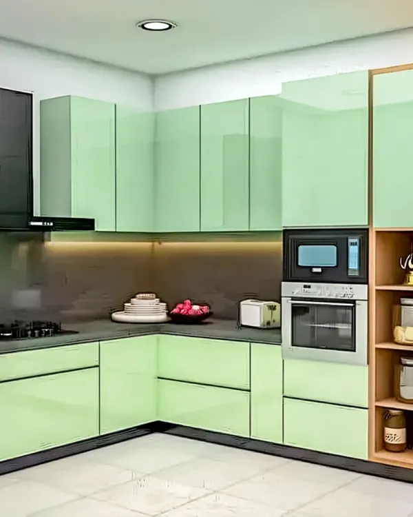 A fresh and modern kitchen with mint green high-gloss cabinets and integrated appliances for a seamless look.