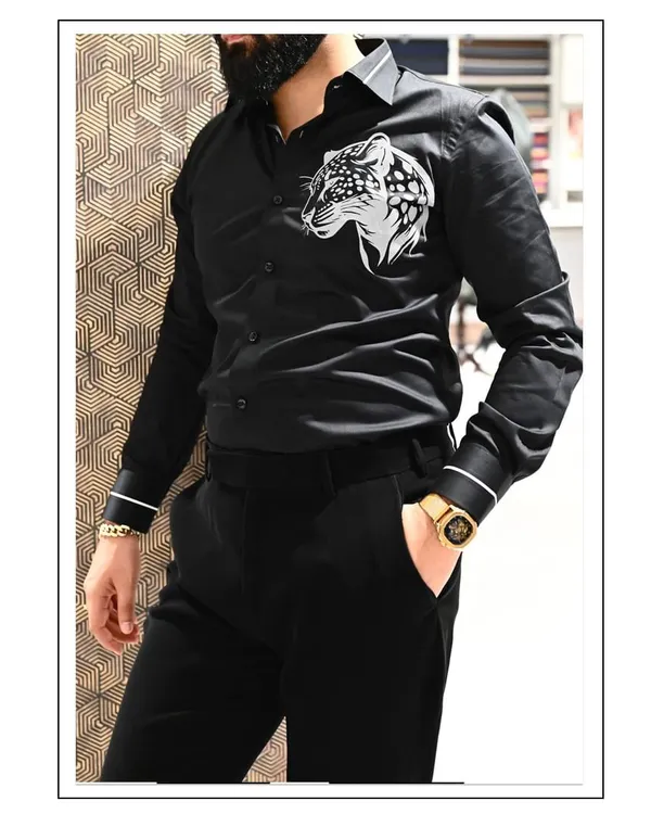 A custom-designed black shirt featuring a handmade printed tiger motif. This is for the client who wants a unique piece that is both stylish and bold.