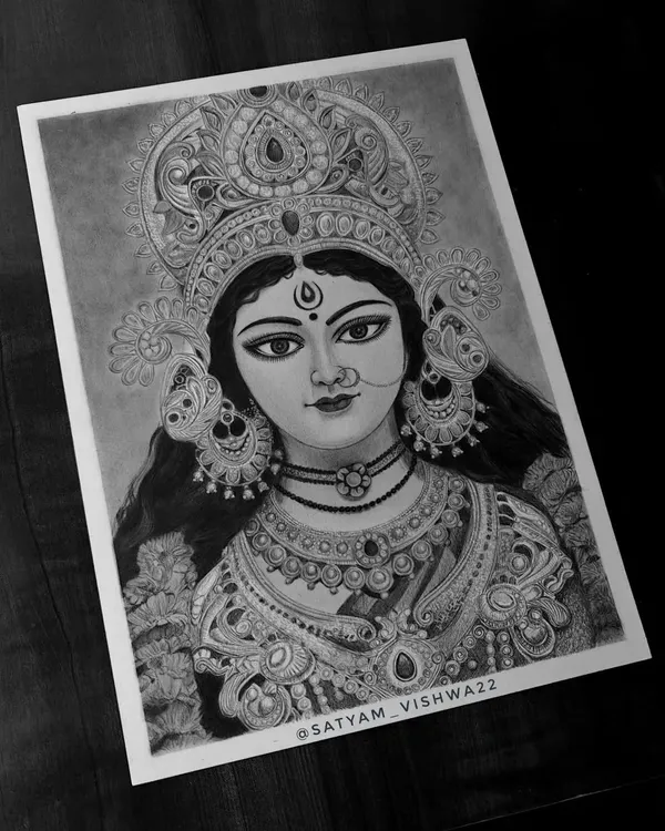 This is one of my most detailed graphite and charcoal portraits of Maa Durga. I focused on capturing the serene yet powerful expression in her eyes, making it a perfect centerpiece for a pooja room or as a Navaratri gift.