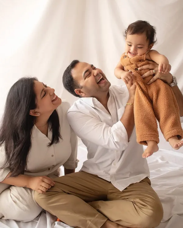 I believe in capturing the real, simple moments. This beautiful family's laughter is exactly the kind of authentic joy I love to photograph during our sessions.