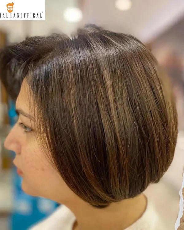 This bob cut is the perfect breeze for the autumn season. The subtle highlights transition the hair from a summer look to a chic, stylish autumn hue.