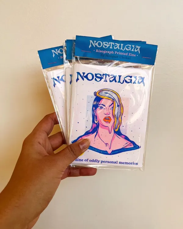 My three-color Risograph printed zine, 'Nostalgia.' I love the vibrant, slightly misaligned aesthetic of Riso printing, which perfectly suited this project about personal memories.