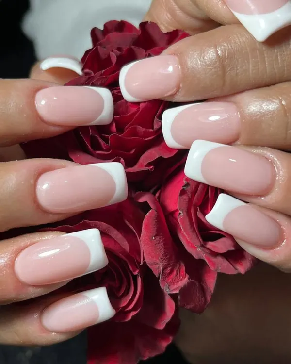 The French manicure is always a classic choice. Here, I've created a flawless set on square-shaped nail extensions, offering a look that is classy, subtle, and effortlessly chic.