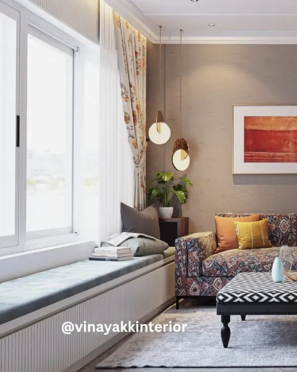 This living room is a masterclass in mixing patterns and textures. The printed sofa, geometric ottoman, and blush wingback chairs come together to create a space that is full of character and warmth. The window seat is the perfect spot to curl up with a book.