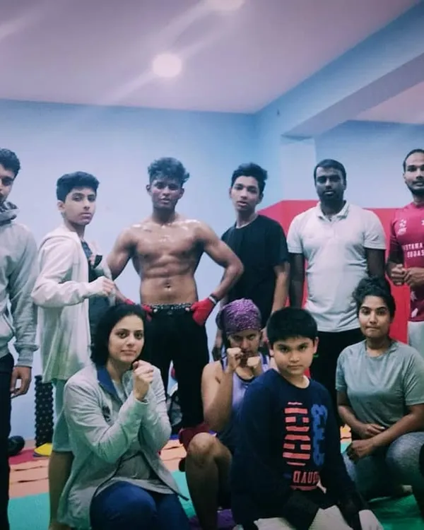 Look at the focus and determination. This is our tribe, a group of everyday people who come here to bring out the fighter within. We train hard and support each other every step of the way.