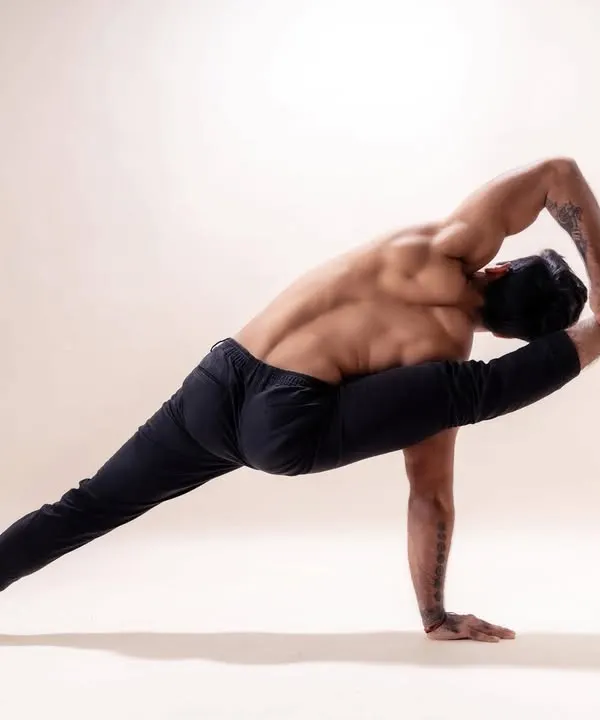 This advanced posture demonstrates the strength and flexibility that can be achieved through dedicated practice. In my classes, we work step by step to build the foundation required for such asanas safely.